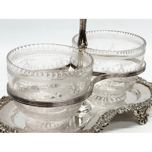 164 - A Victorian silver plated sugar and cream stand/tea caddy, with etched glass bowls. Bowls measure 10... 