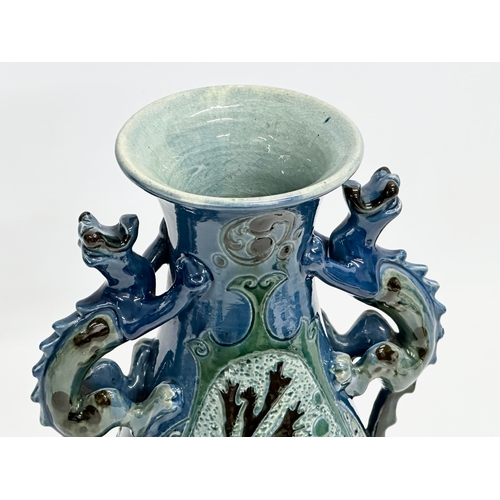 15 - An early 20th century C.H. Brannam Barum Ware glazed pottery vase designed by Frederick Bowden. 1905... 