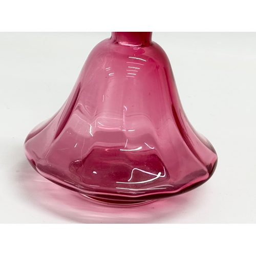 165 - A mid 20th century Cranberry Glass decanter. 14x19cm