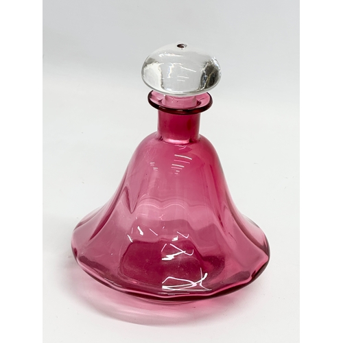 165 - A mid 20th century Cranberry Glass decanter. 14x19cm