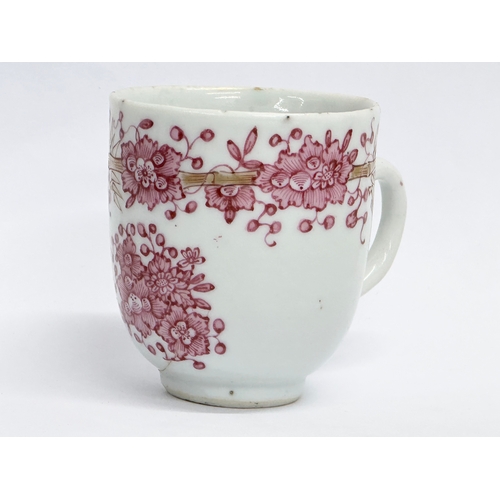 219 - An 18th century Lowestoft porcelain coffee cup. Circa 1760-1780. 8x6x6.5cm