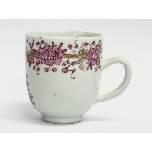 219 - An 18th century Lowestoft porcelain coffee cup. Circa 1760-1780. 8x6x6.5cm