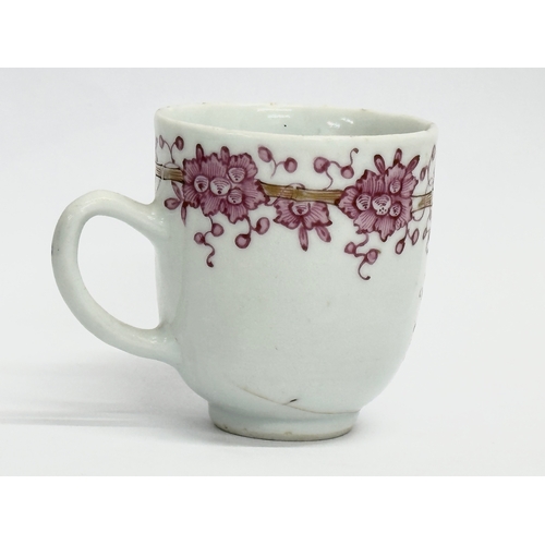 219 - An 18th century Lowestoft porcelain coffee cup. Circa 1760-1780. 8x6x6.5cm