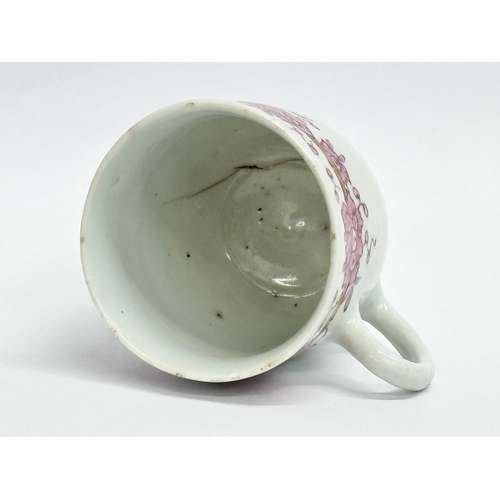 219 - An 18th century Lowestoft porcelain coffee cup. Circa 1760-1780. 8x6x6.5cm