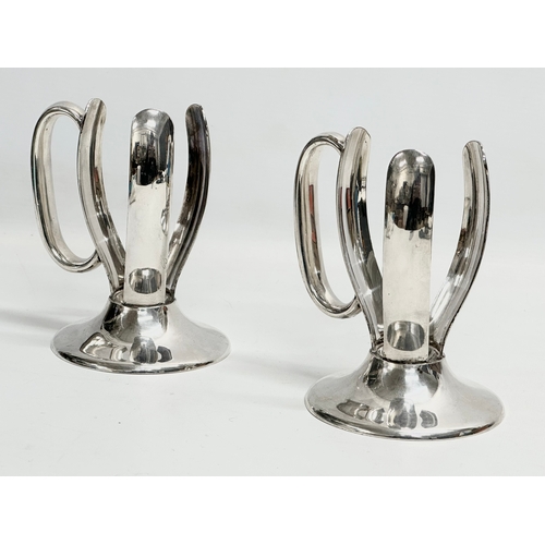 170 - A pair of 19th century Roberts & Belk silver plated ‘Torpedo’ bottle holders with bottles. Including... 