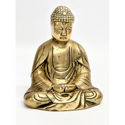 228 - Early 20th century brass Buddha figure and an ornate brass trinket box. 13.5x7.5x5.5cm. 13x15cm