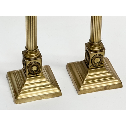 92 - A pair of good quality Victorian brass candlesticks. 9.5x9.5x23.5cm