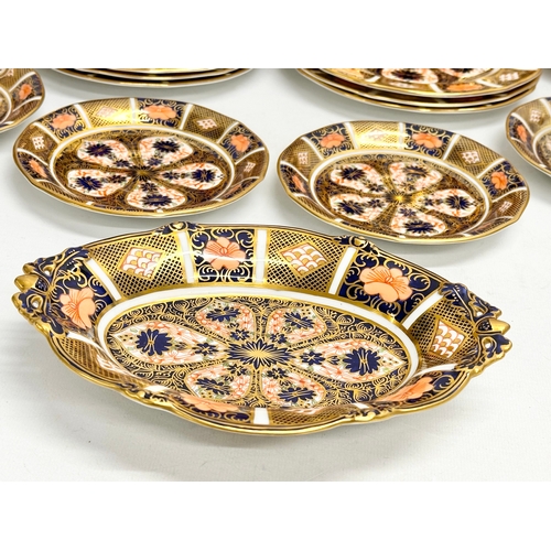 19 - An early 20th century 21 piece Royal Crown Derby Imari tea service. 2 cake plates, 4 cups, 6 saucers... 