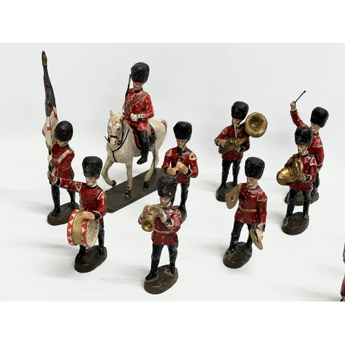 533 - A collection of 1930’s Elastolin British model soldiers. Germany. 11cm. Horse 15cm