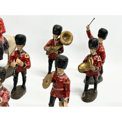 533 - A collection of 1930’s Elastolin British model soldiers. Germany. 11cm. Horse 15cm