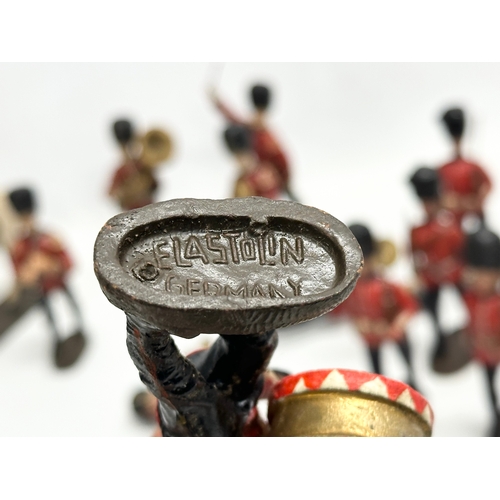 533 - A collection of 1930’s Elastolin British model soldiers. Germany. 11cm. Horse 15cm