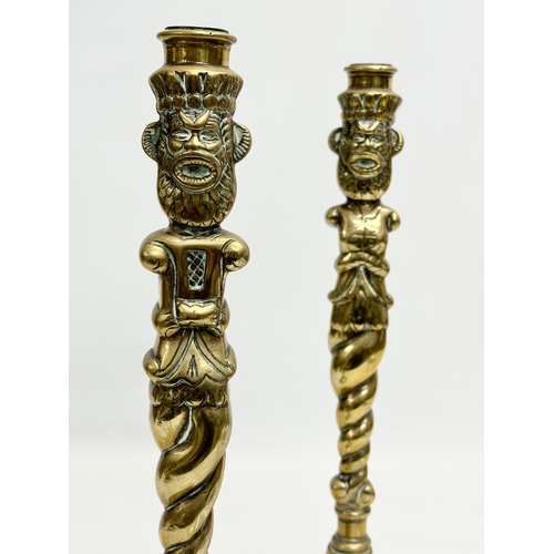 93 - A pair of large Victorian brass candlesticks. 35cm