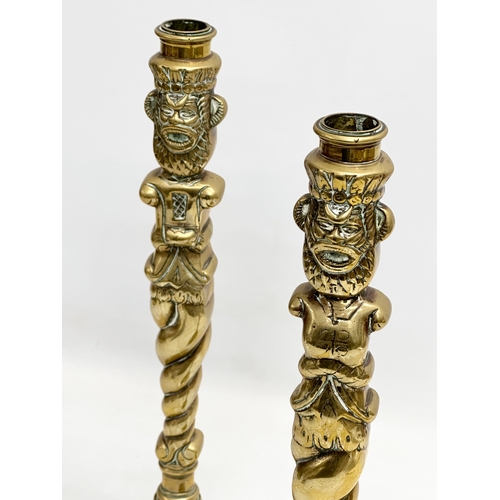 93 - A pair of large Victorian brass candlesticks. 35cm