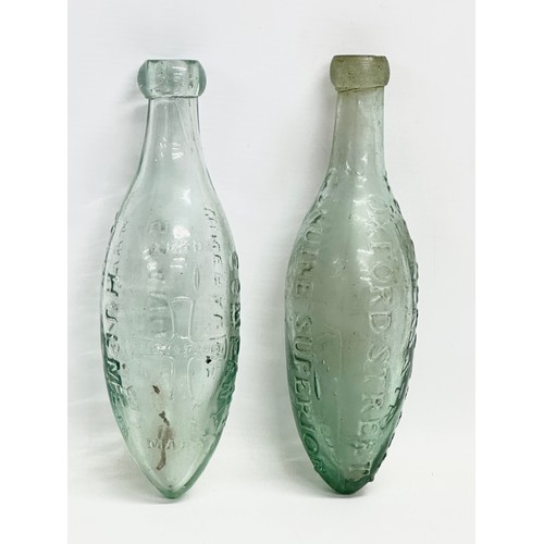 170 - A pair of 19th century Roberts & Belk silver plated ‘Torpedo’ bottle holders with bottles. Including... 