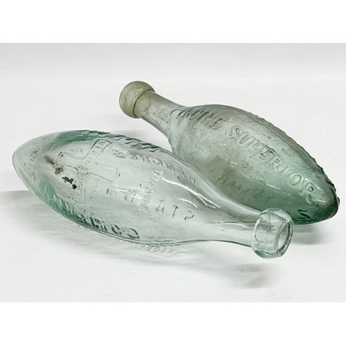 170 - A pair of 19th century Roberts & Belk silver plated ‘Torpedo’ bottle holders with bottles. Including... 