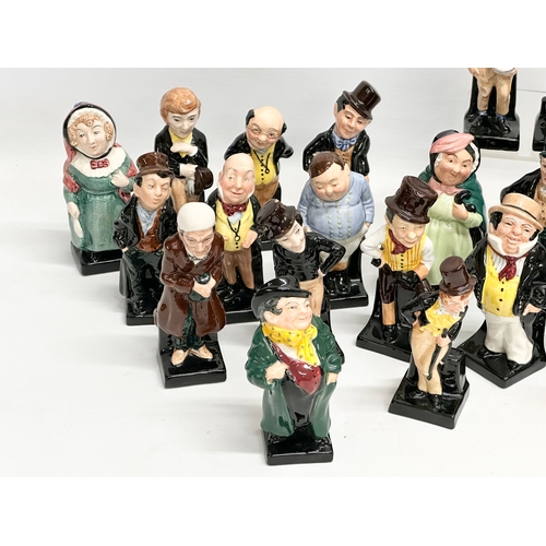 240 - A large collection of Royal Doulton miniature Charles Dickens character figures. 12cm