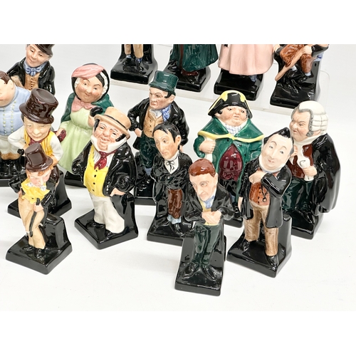 240 - A large collection of Royal Doulton miniature Charles Dickens character figures. 12cm