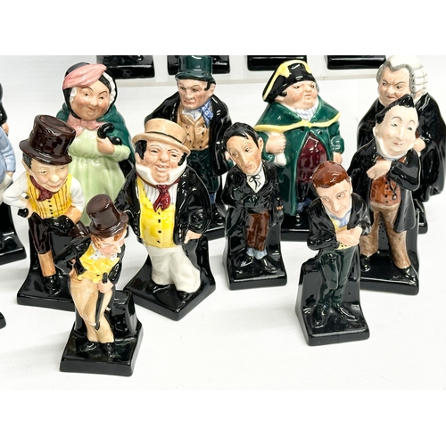 240 - A large collection of Royal Doulton miniature Charles Dickens character figures. 12cm