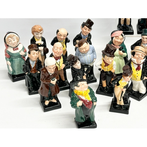 240 - A large collection of Royal Doulton miniature Charles Dickens character figures. 12cm