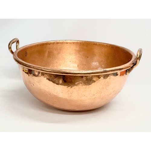 99 - A large mid 19th century French heavy copper whisky mixing bowl. 58x54x28cm