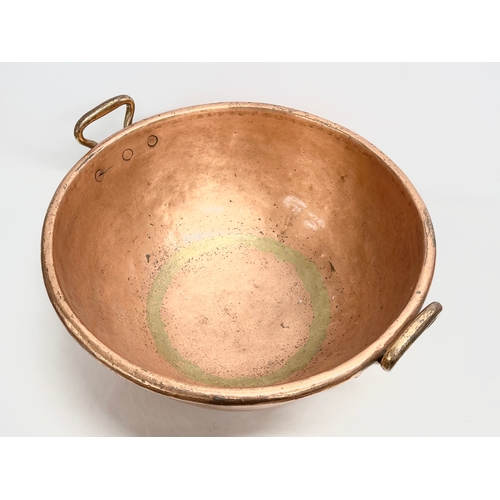 99 - A large mid 19th century French heavy copper whisky mixing bowl. 58x54x28cm