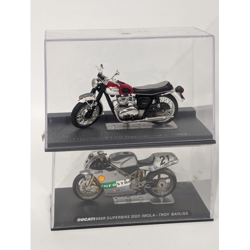 574 - A collection of model cars and motorbikes