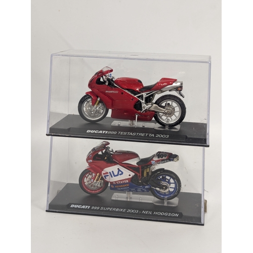 574 - A collection of model cars and motorbikes