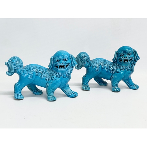 236 - A collection of vintage Chinese Foo Dogs. Largest pair 22x14.5cm.