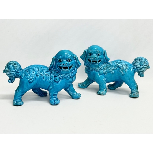 236 - A collection of vintage Chinese Foo Dogs. Largest pair 22x14.5cm.