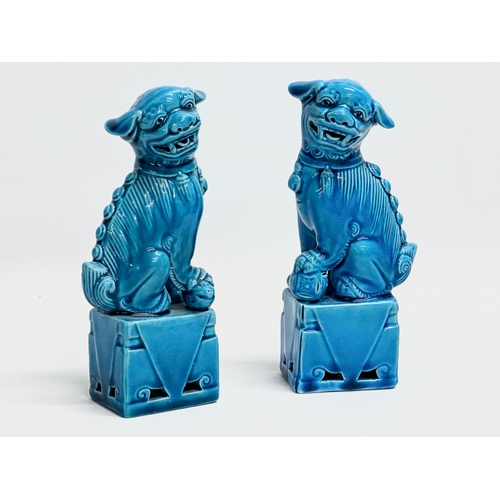 236 - A collection of vintage Chinese Foo Dogs. Largest pair 22x14.5cm.