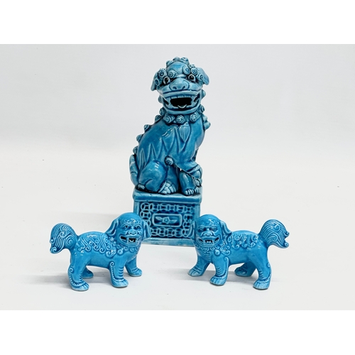 236 - A collection of vintage Chinese Foo Dogs. Largest pair 22x14.5cm.