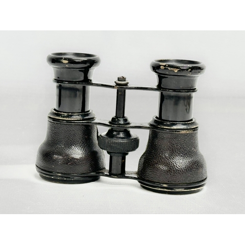 247 - A pair of vintage Field Glasses with original case. 10.5x7.5cm extended.