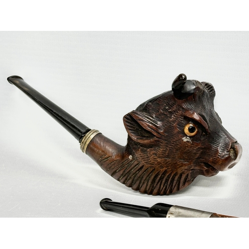 262 - 2 late 19th/early 20th century character smoking pipes. 15cm