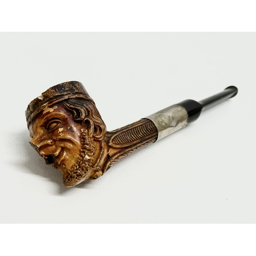 262 - 2 late 19th/early 20th century character smoking pipes. 15cm