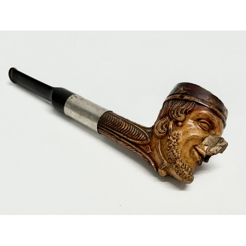 262 - 2 late 19th/early 20th century character smoking pipes. 15cm