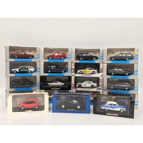 629 - A collection of Minichamp model cars