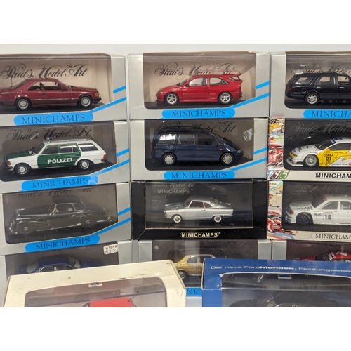 629 - A collection of Minichamp model cars