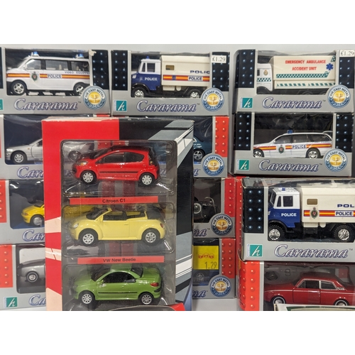 630 - A collection of Cararama model cars and trucks. Scale 1:43.