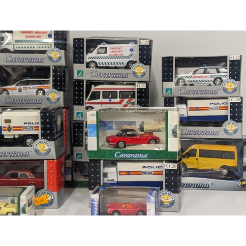 630 - A collection of Cararama model cars and trucks. Scale 1:43.