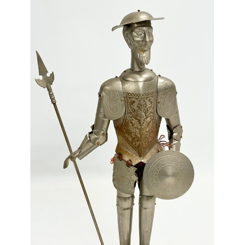 328 - 2 vintage steel armoured knights. 35cm