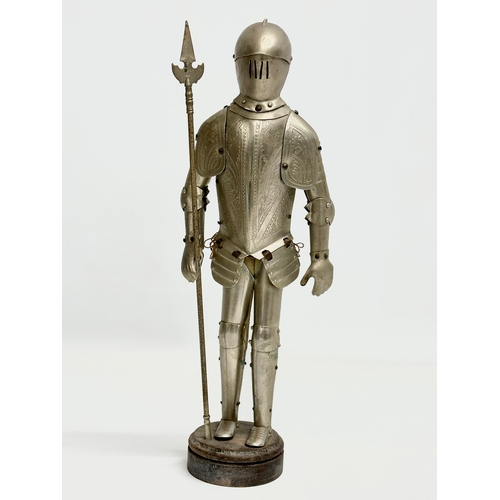 328 - 2 vintage steel armoured knights. 35cm