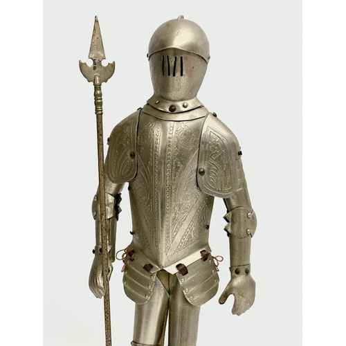 328 - 2 vintage steel armoured knights. 35cm