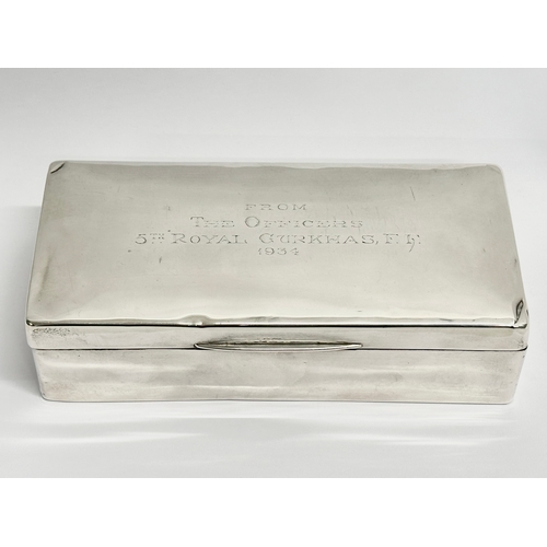 22 - A sterling silver presentation box and a silver mounted Gurkha Kukri knife. Presented to a Belfast O... 