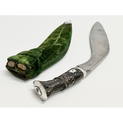 22 - A sterling silver presentation box and a silver mounted Gurkha Kukri knife. Presented to a Belfast O... 