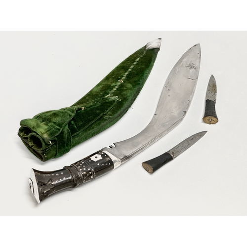 22 - A sterling silver presentation box and a silver mounted Gurkha Kukri knife. Presented to a Belfast O... 