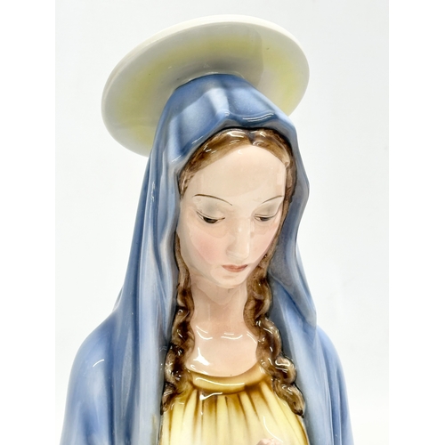 329 - An early 20th century Keramos pottery Madonna figure. Austria. 1920-1930. 27cm