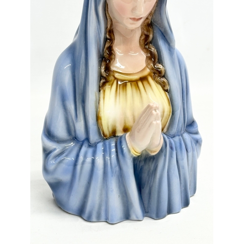 329 - An early 20th century Keramos pottery Madonna figure. Austria. 1920-1930. 27cm