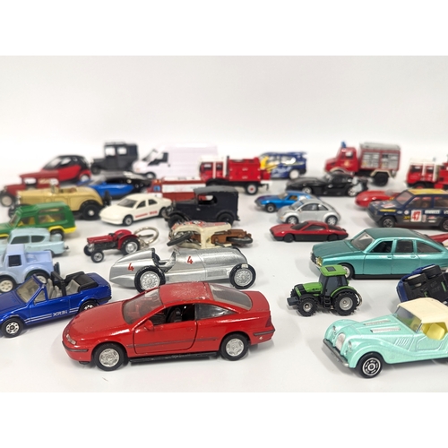 634 - A collection of model cars and trucks including Matchbox, Corgi, Solido, etc