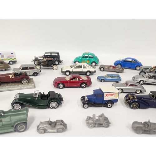 635 - A collection of model cars and trucks including Matchbox, Lledo, Solido, etc