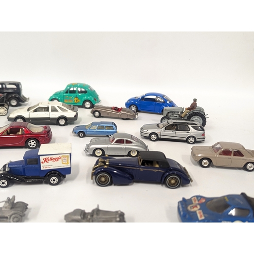 635 - A collection of model cars and trucks including Matchbox, Lledo, Solido, etc